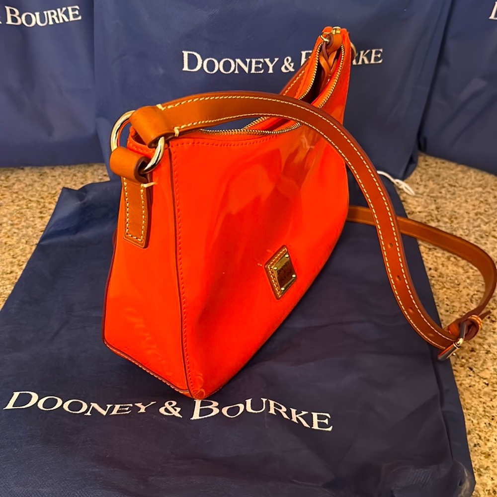A substantial adjustable shoulder strap classic crossbody hobo 
.